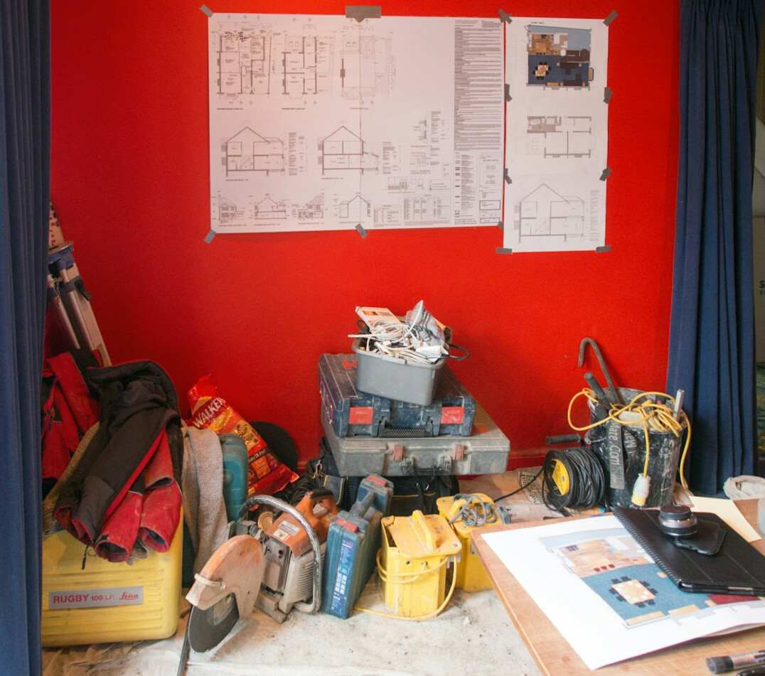 Workshop table covered with charts and progress notes