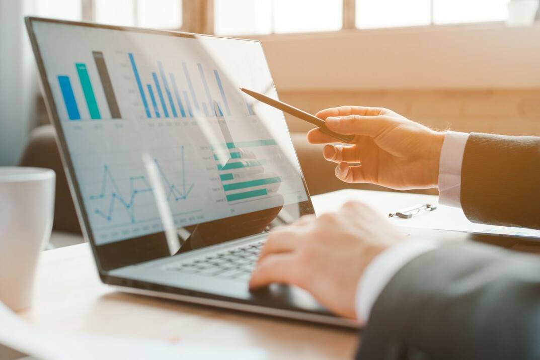 Executives reviewing performance indicators together